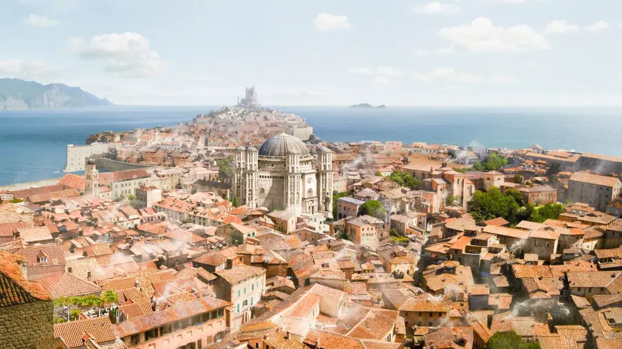 En vy &ouml;ver en stad vid havet, liknande Dubrovnik i Game of Thrones, med r&ouml;da tegeltak och en stor kupolbyggnad.